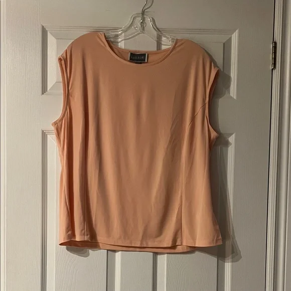 Chic Light peach colored Sleeveless Blouse - Picture 1 of 4
